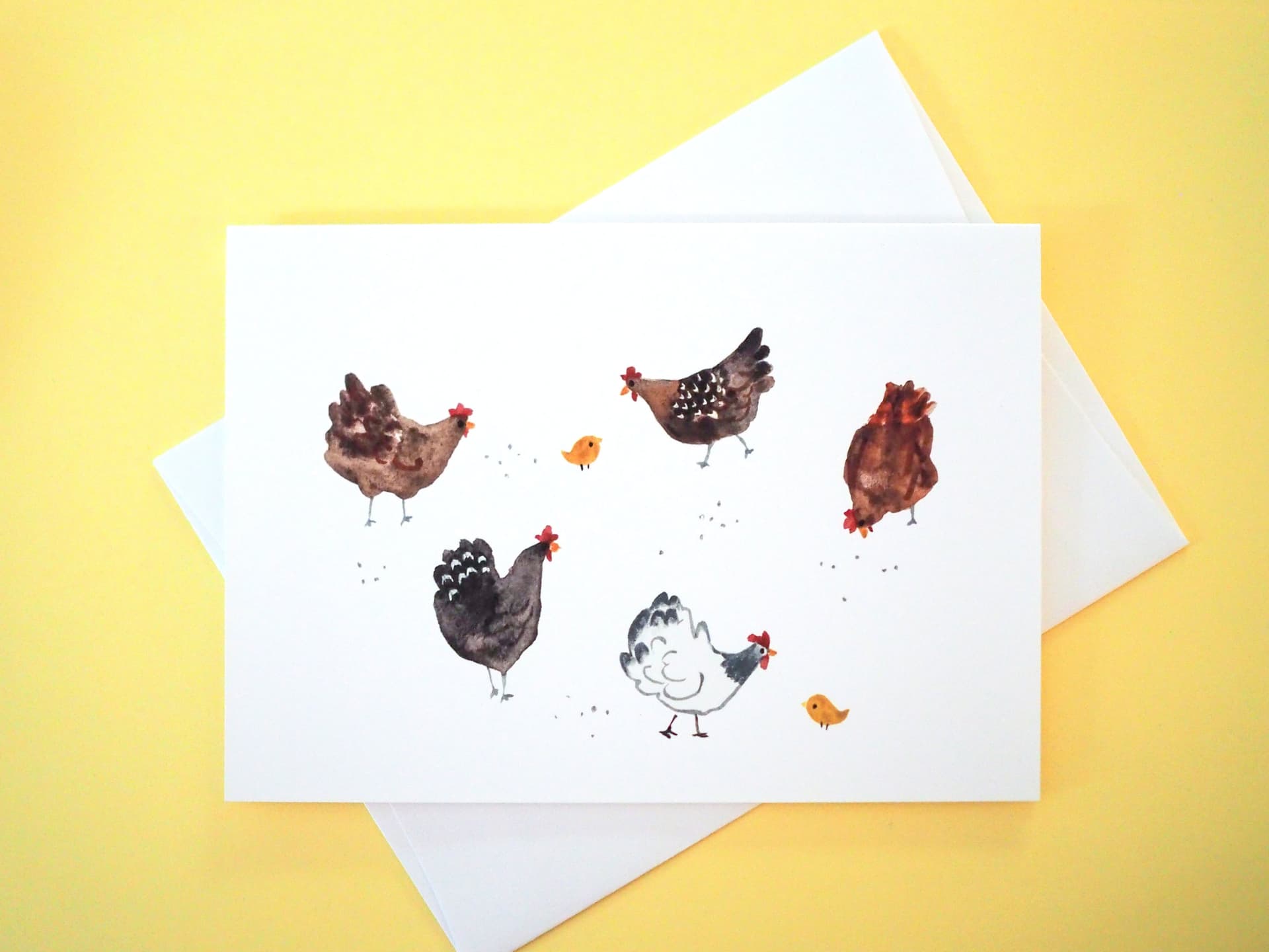 Card with illustrations of chickens on a yellow background