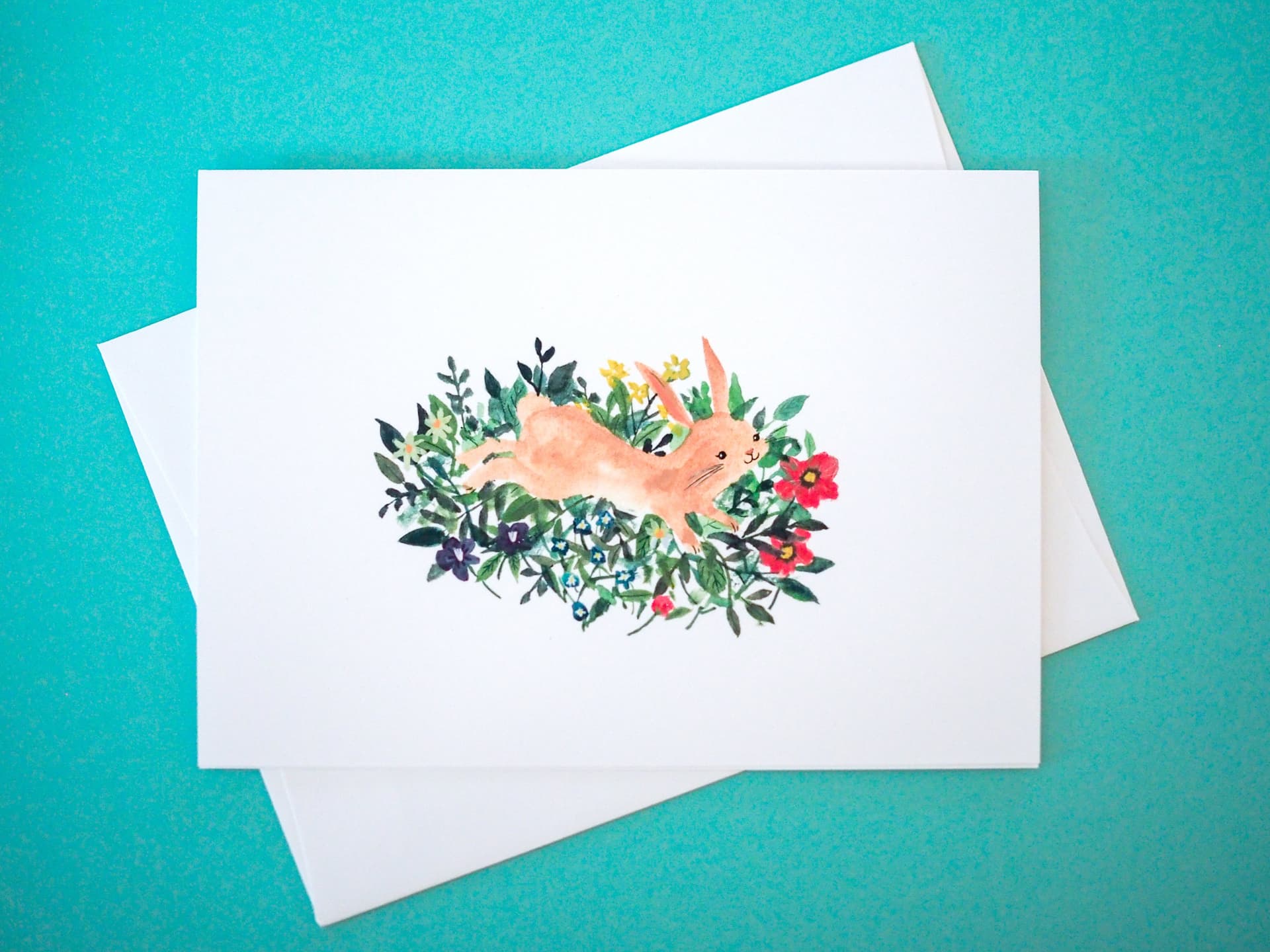 Bunny Jumping in Flowers Card